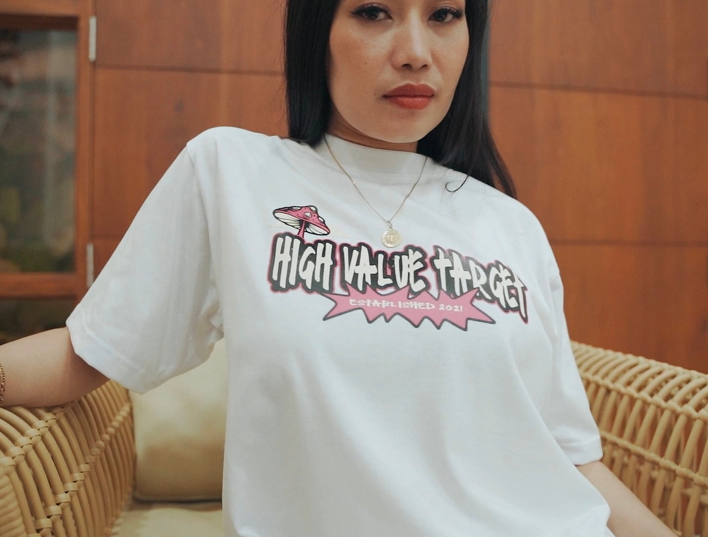 Graphic tee featuring mushroom artwork with High Value Target Established 2021 lettering, modern streetwear style