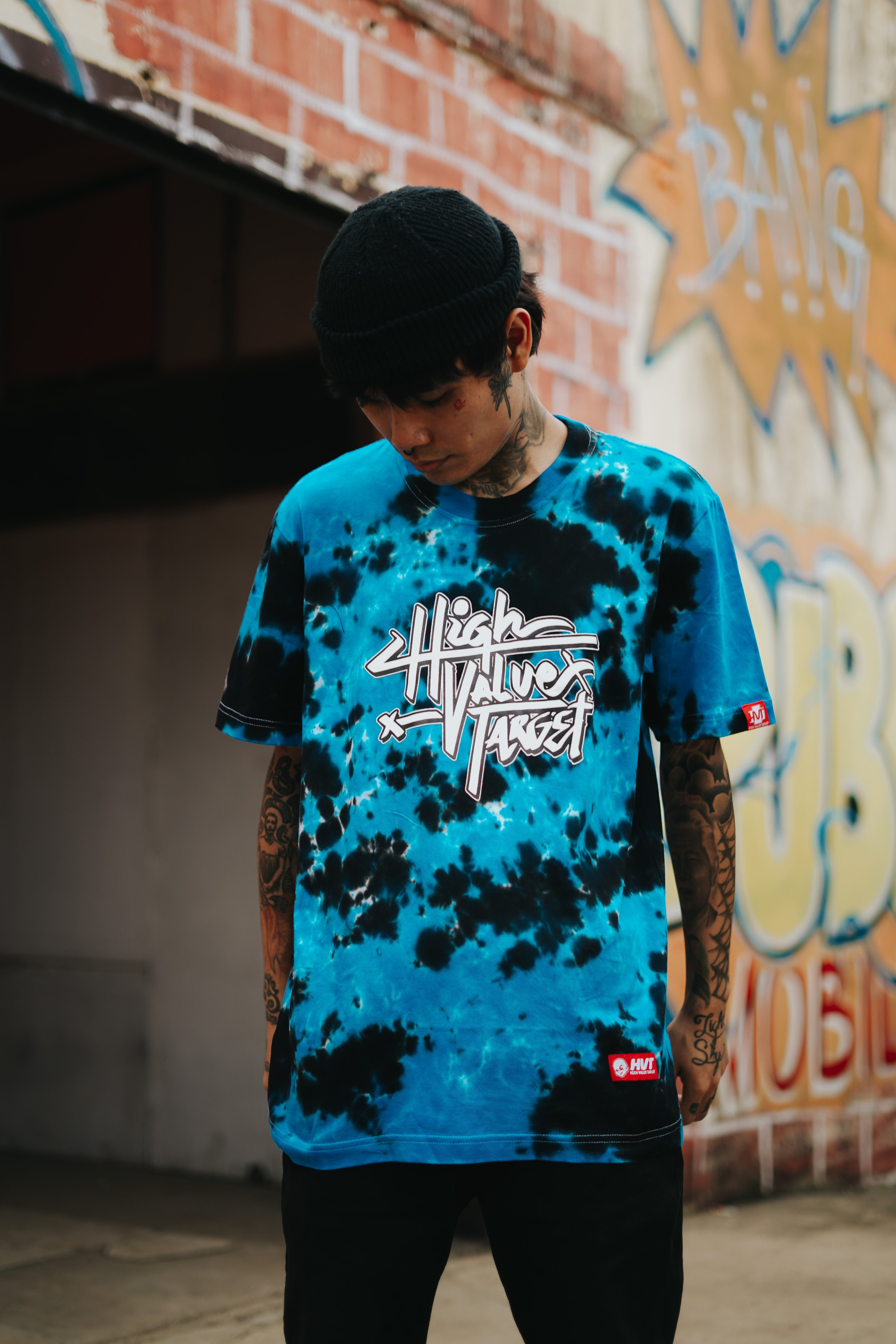 Turquoise tie dye T shirt for relaxed casual wear with unique color blending design